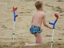 2017-73 Beach boy has 2 crutches