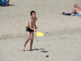 2018-027 Boy playing racket on the beach
