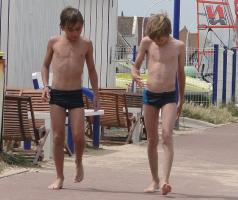 2011 - 9th album - Beach boys in speedos coming back from the toilets