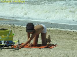 2017-137 Beach boy dog position white swimsuit black cap