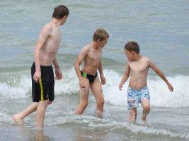 2017-248 3 beach boys various ages in the sea