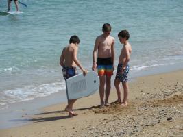 2019-002 Boy surfers on the beach