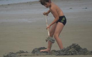 2020-069 Boy playing on the beach