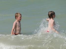2011 - 43rd album - Two beachboys friends in swim suit in the ocean