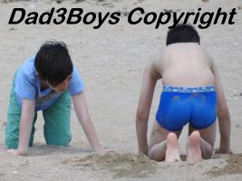 2017-38 Boys in nice positions on the beach