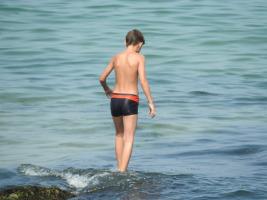 2017-352 Beach boy walking on the water