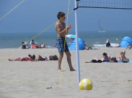 2018-043 Boy playing volley ball on the beach