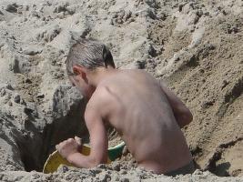 2011 - 5th album - Beach boy in grey underwear digging a hole and a tunnel