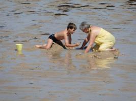 2015-023 Boys on beaches in water with grandmam