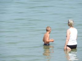 2017-339 Beach boy hesitating to enter in the sea then, no !