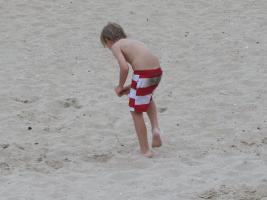 2018-050 Boy in short walking on the beach