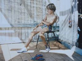 2018-052 Boy in swimsuit sit on a chair ready for men