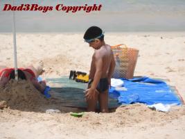 2017-15 boy in a hole on the beach