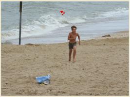2017-173 Beach boy running from the sea