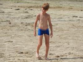 2020-049 Boy in blue back on the beach