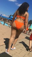 Young Latina w Cellulite Orange Bikini