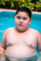 AI GEN chubby boy in the pool 2