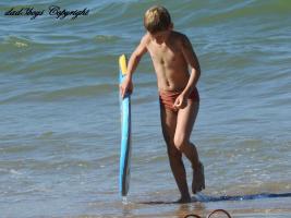 2016-178 Beach boy and his surf board