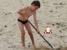 2017-186 Beach boy and his shovel