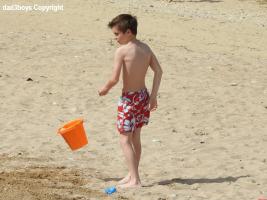 2016-074 Beach boy with his orange bucket