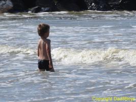 2017-107 Beach boy entering in the sea