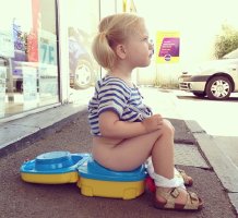 Baby girl/boy with carry potty